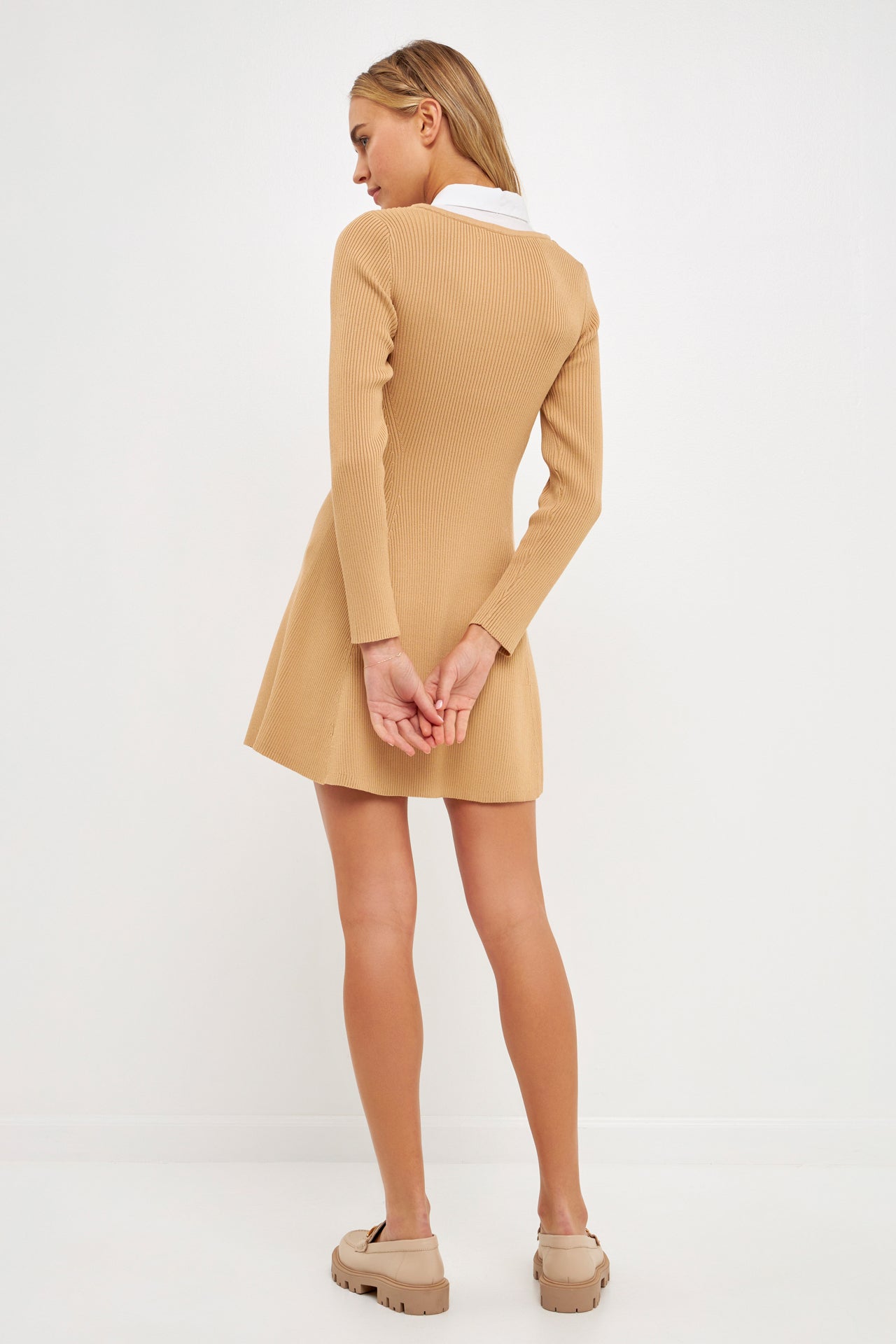 A relevant stock photo of sweater dres manufacturer in a typical setting.