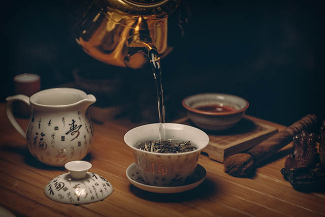 A relevant stock photo of tea china in a typical setting.