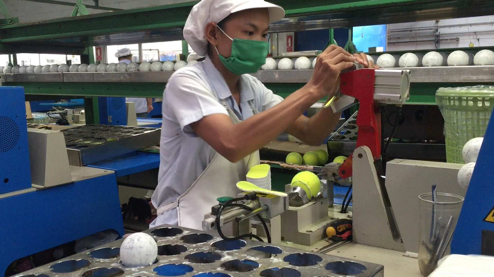 A relevant stock photo of tennis ball manufacturer in a typical setting.