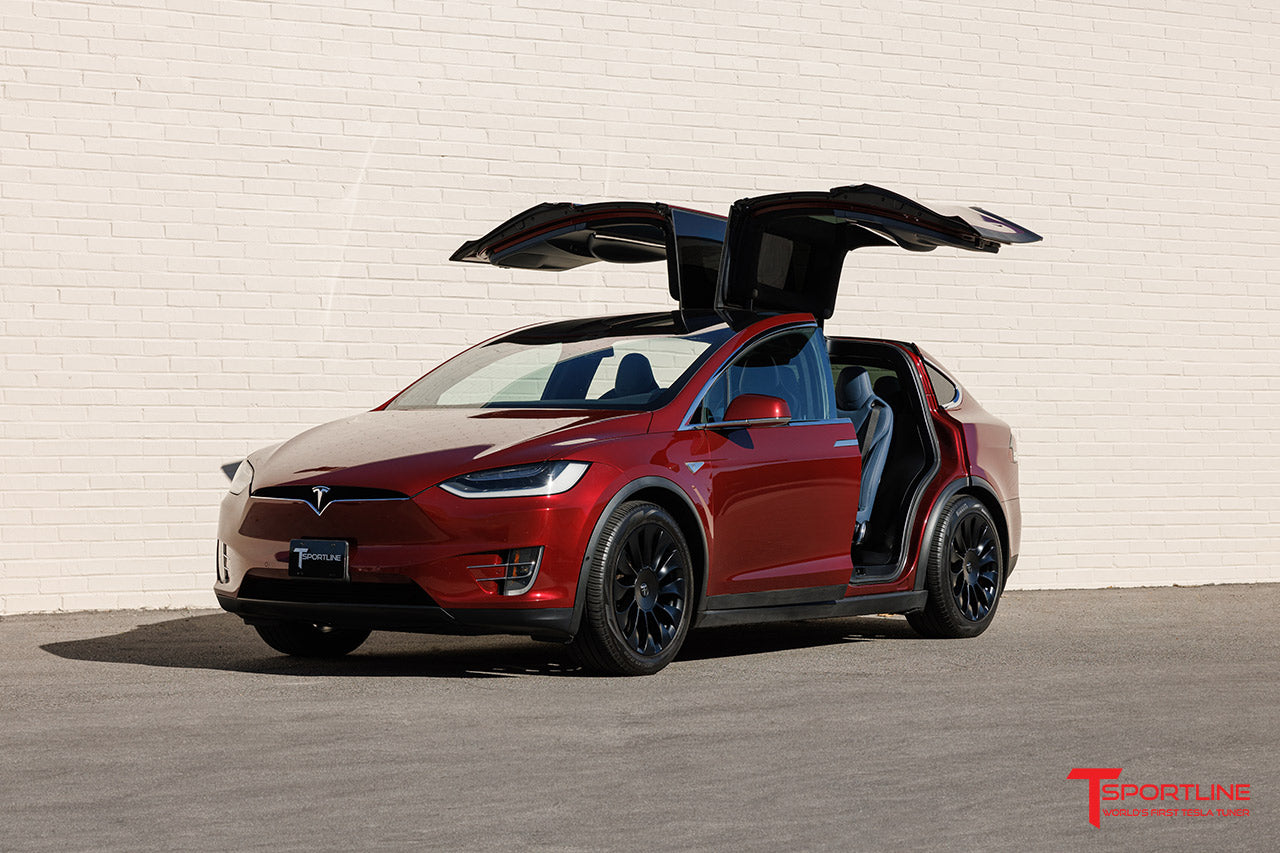 A relevant stock photo of tesla model x plaid custom in a typical setting.