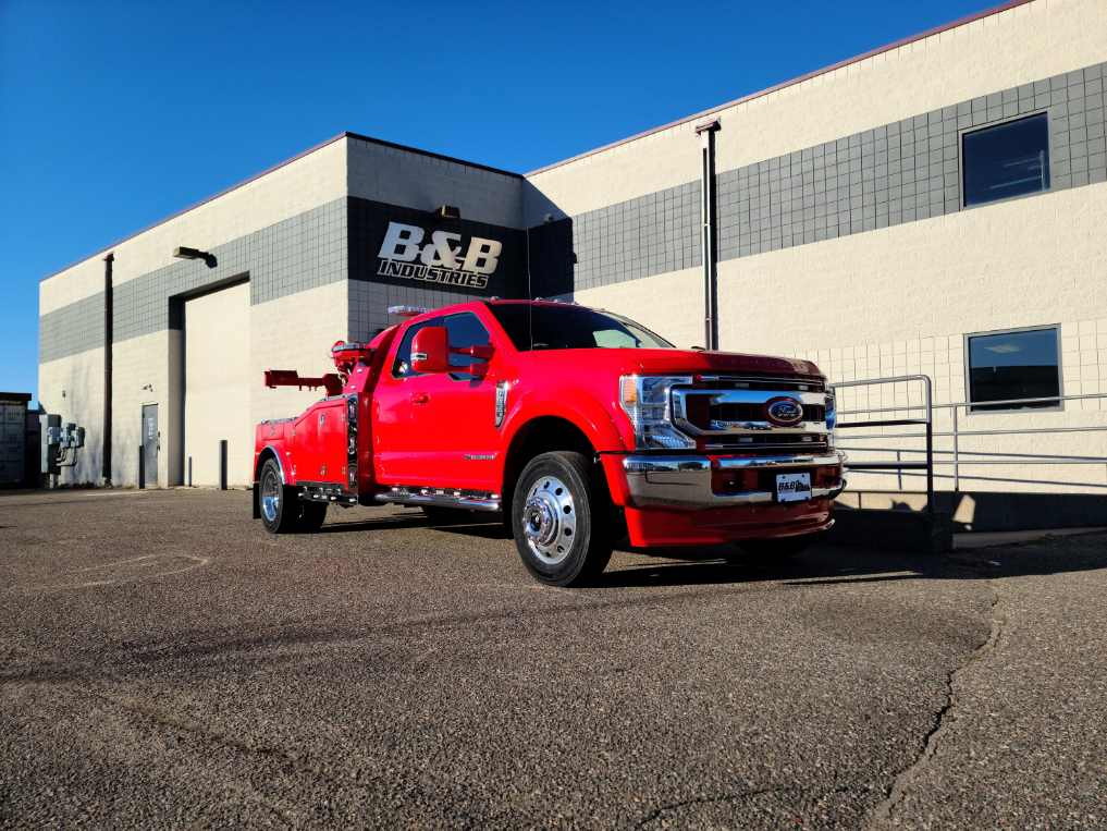 A relevant stock photo of tow truck custom in a typical setting.