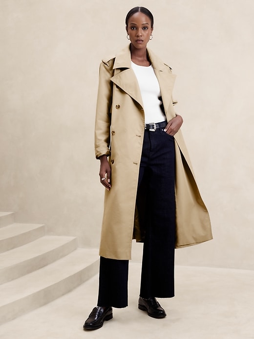 A relevant stock photo of trench coat manufacturer in a typical setting.