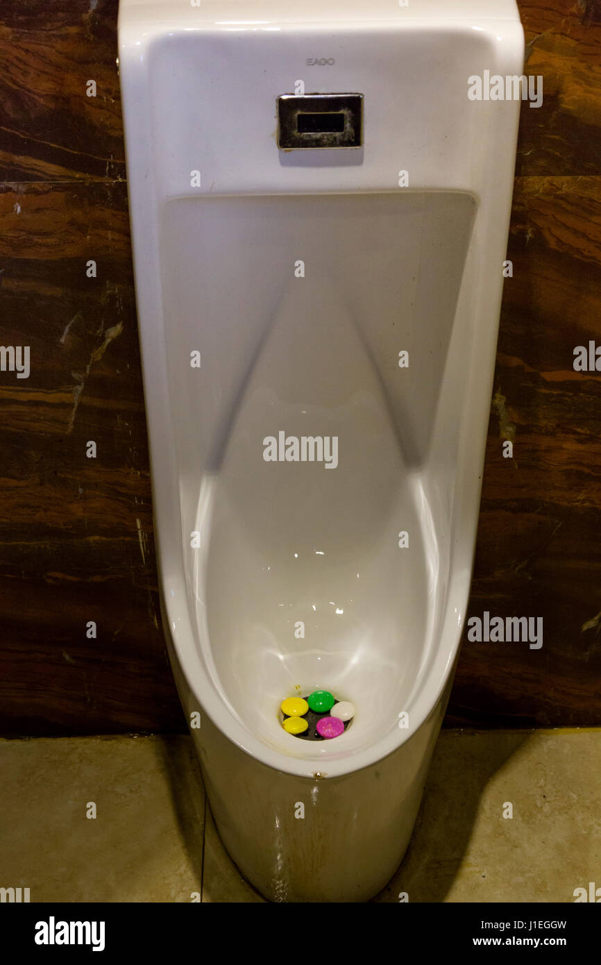A relevant stock photo of urinal china in a typical setting.