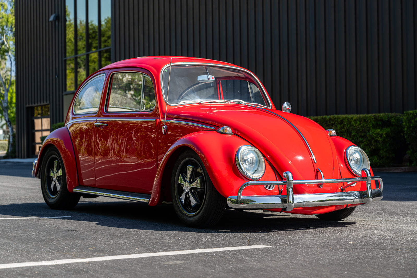 A relevant stock photo of vw bug custom in a typical setting.