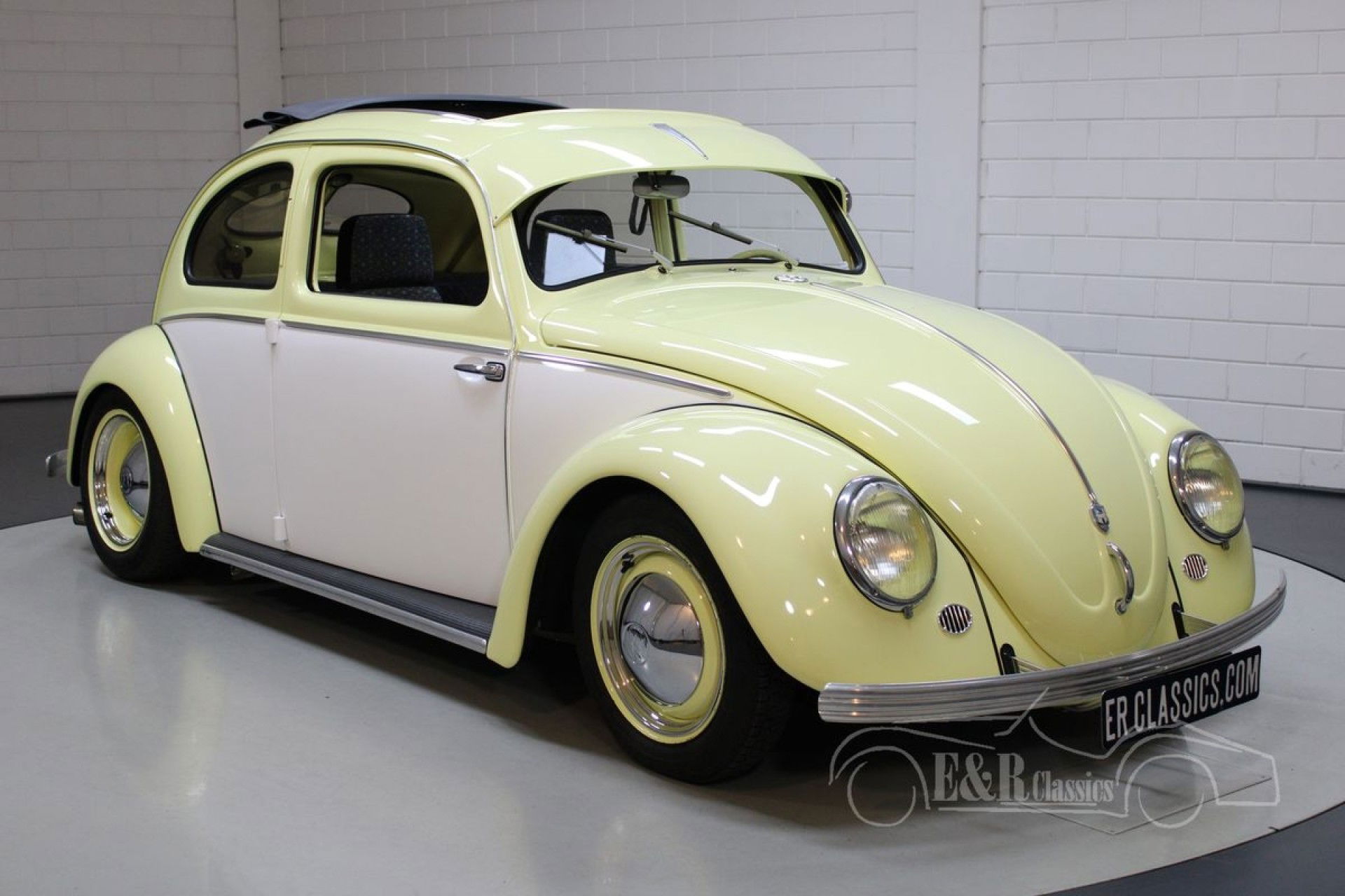 A relevant stock photo of vw bug custom in a typical setting.