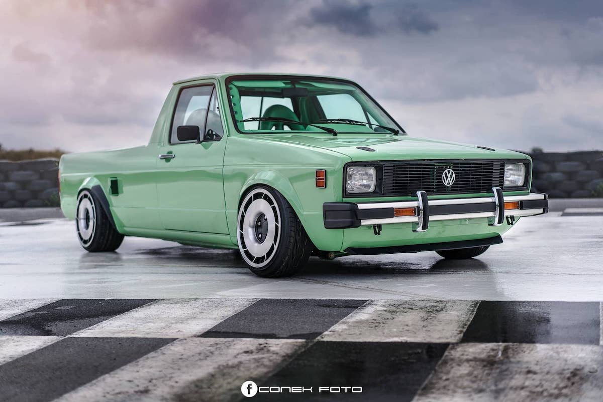 A relevant stock photo of vw rabbit pickup custom in a typical setting.