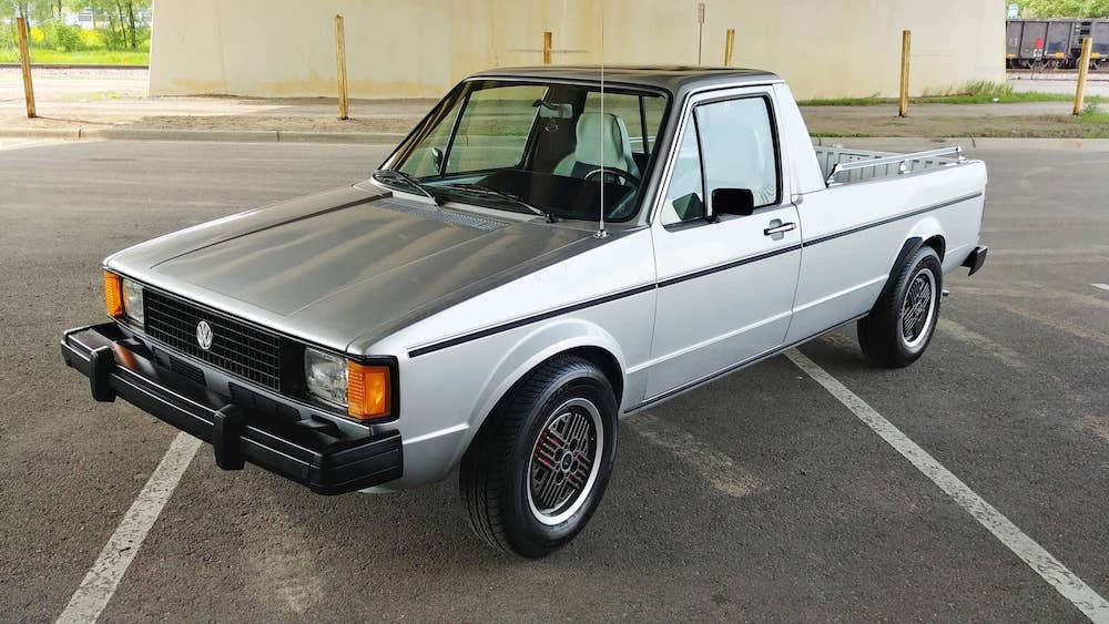 A relevant stock photo of vw rabbit pickup custom in a typical setting.