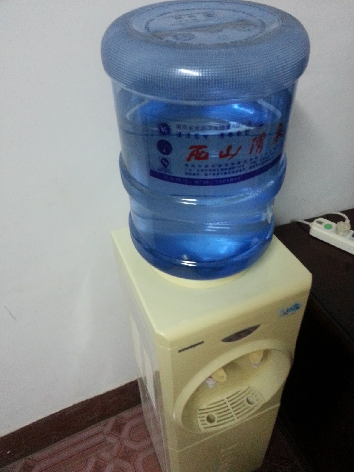 A relevant stock photo of water dispenser china in a typical setting.