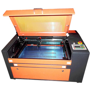 A relevant stock photo of wood engraving machine china in a typical setting.