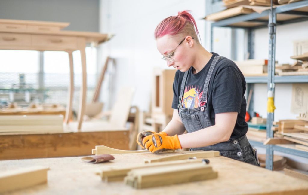 A relevant stock photo of wood furniture supplier in a typical setting.
