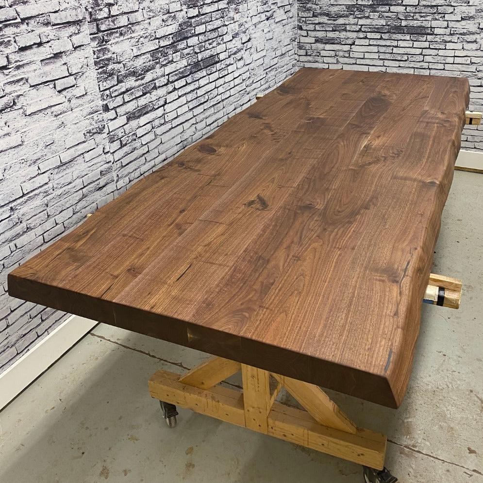 A relevant stock photo of wood table top custom in a typical setting.