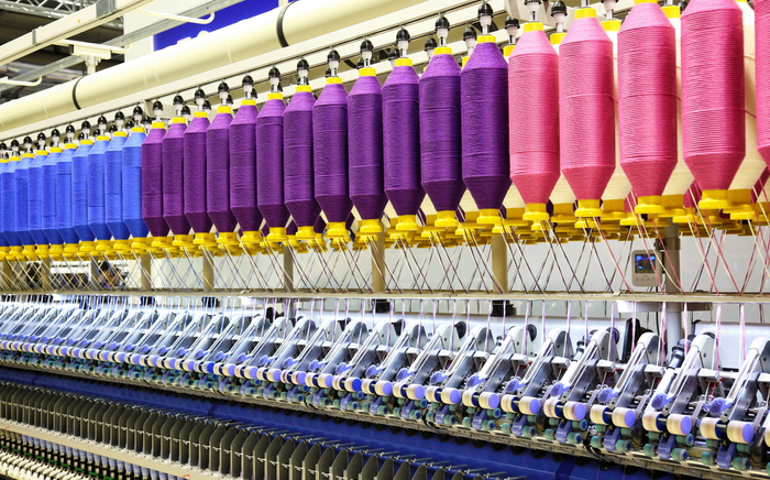 A relevant stock photo of yarn manufacturer in a typical setting.