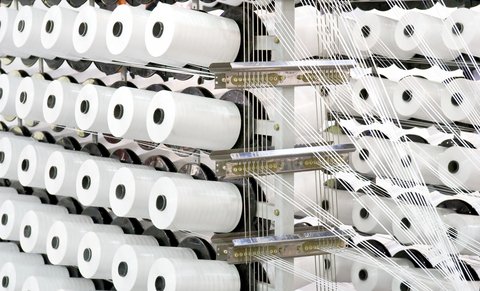 A relevant stock photo of yarn manufacturer in a typical setting.